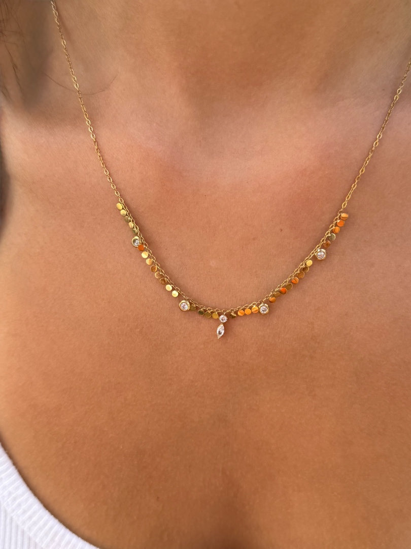 Necklace with multicolored beads on a person's neck